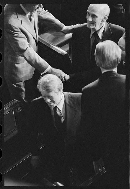 [President Jimmy Carter surrounded by members of Congress...