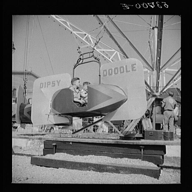 Children enjoying the midway after a parade at the...