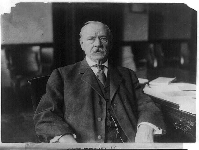 [Grover Cleveland, half-length portrait, seated at desk,...
