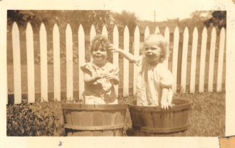 Children in barrels