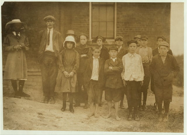 A group of children attending the public school,...