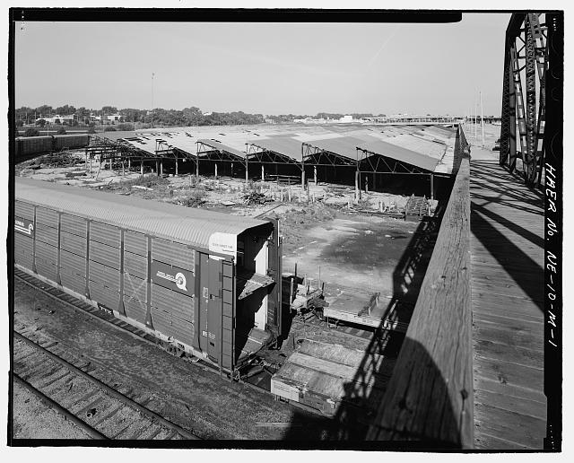1. Overview of hog sheds and railroad tracks from "O"...