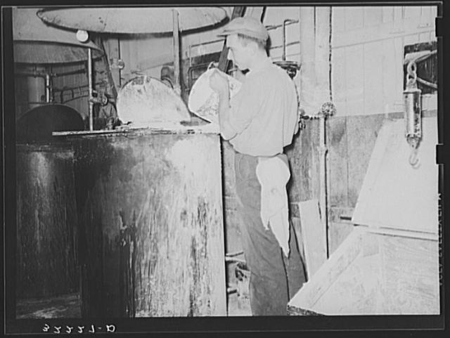 Mixing starch into proper consistency for application to...