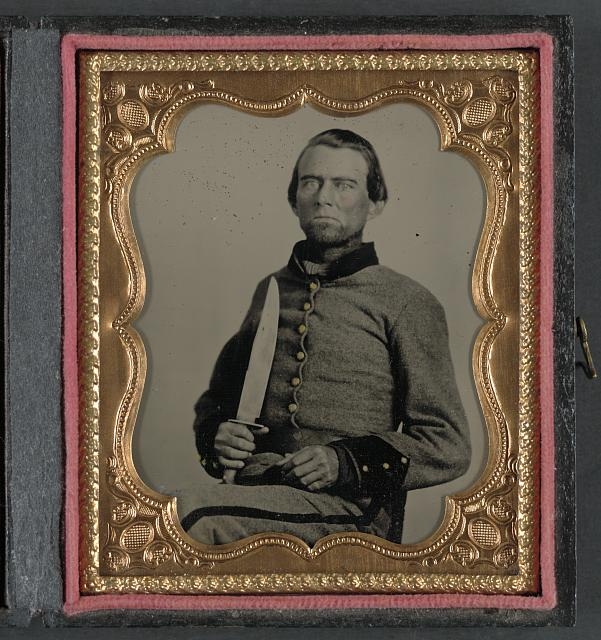 [Unidentified soldier in Confederate uniform with large...