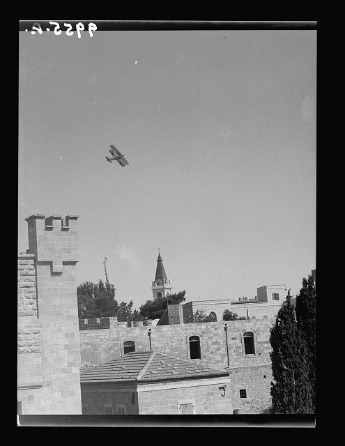 Airplane of R.A.F. above St.Sauveur, Old City