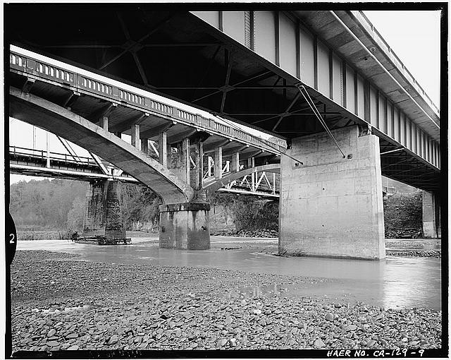 9. VIEW, LOOKING SOUTH OF DOWNSTREAM SIDES OF ALL THREE...