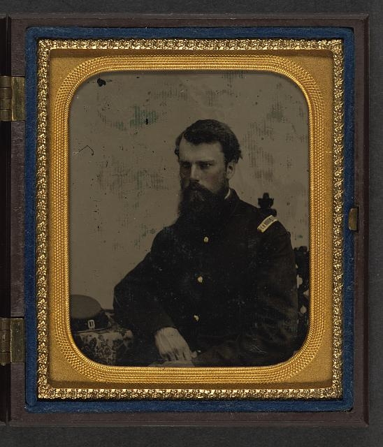 [Unidentified soldier in Union captain uniform resting...