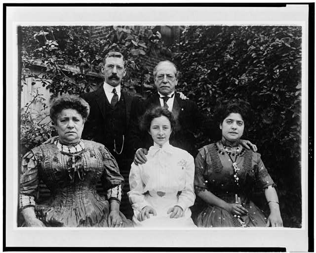 [Samuel Gompers with a man and three women]
