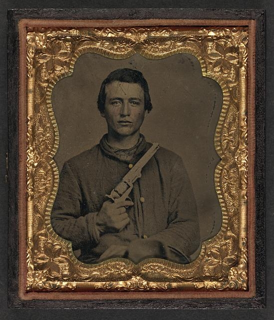[Unidentified soldier in Union uniform holding Colt...