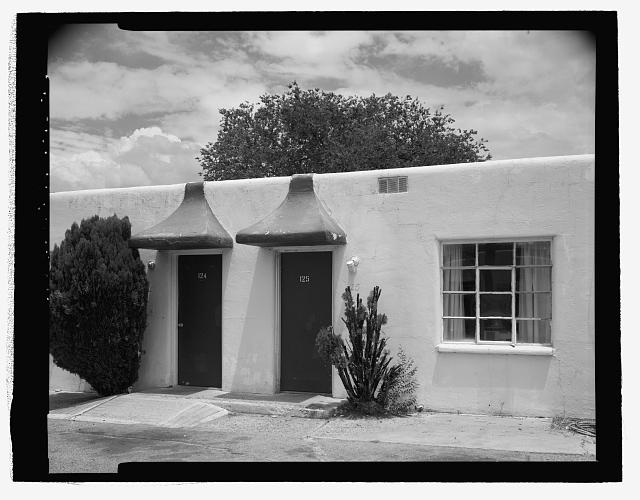 west elevation of east wing, showing doors and...