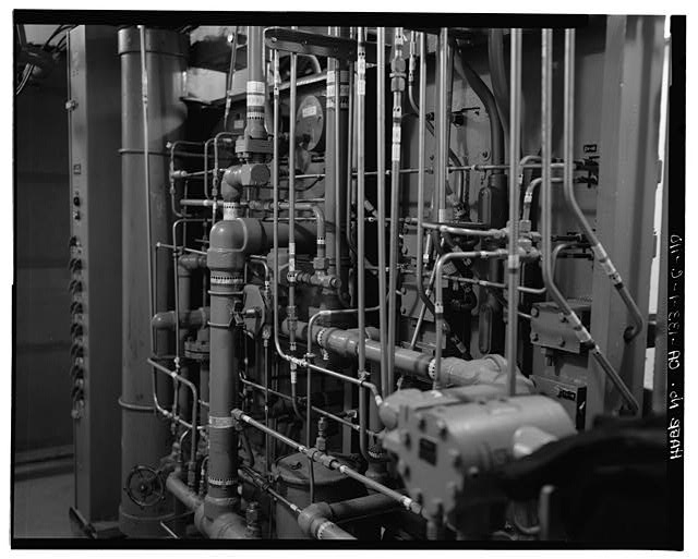 110. TUBING FOR HYDRAULIC FLUID AT BACK OF HYDRAULIC...