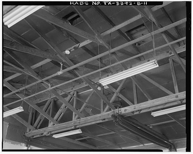 11. Interior detail showing truss structure at shop area...