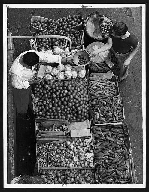 [Overhead view of a pushcart produce stand on Belmont...