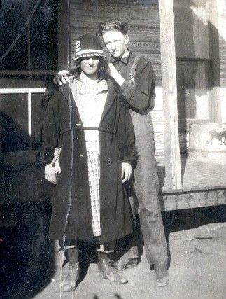 Man and woman standing by porch in Oklahoma