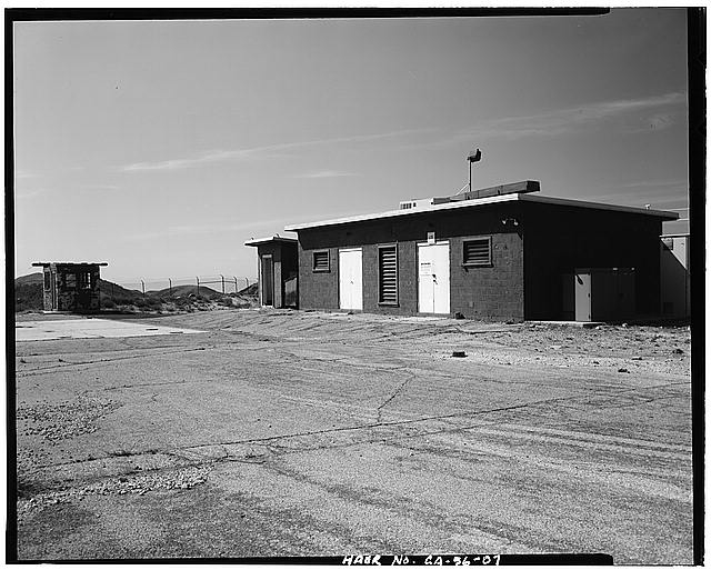 7. VIEW SHOWING STORAGE BUILDING/GUARD HOUSE AT LAUNCH...