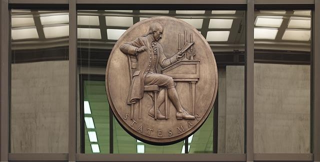 [Entrance Hall. Bronze medallion of James Madison writing...