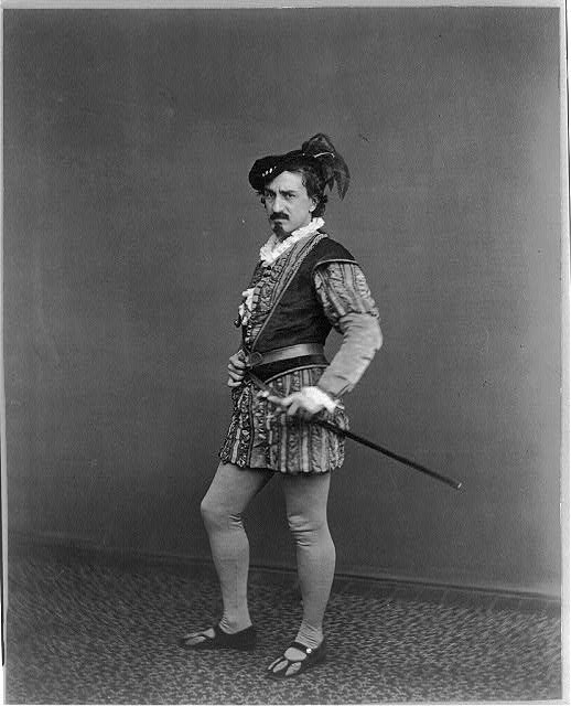 [Edwin Booth as Iago, full-length portrait, standing,...