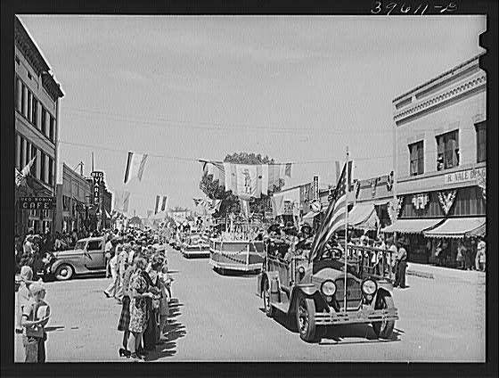 Street scene. Beginning of the Fourth of July parade at...