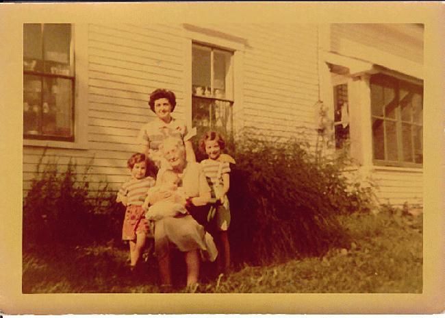 Aunt Annie Hannigan Willette holding Sheila [Maine]
