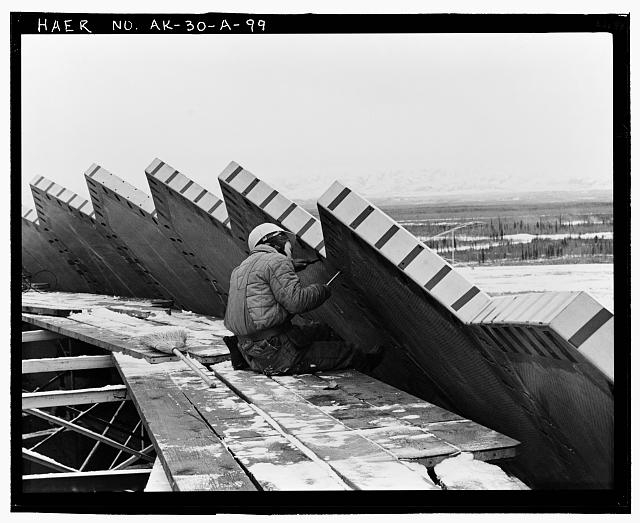 99. View of initial TR panel emplacement for radome, with...