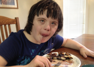 Aaron Sea Rothhammer eating blueberry pancakes on Sunday