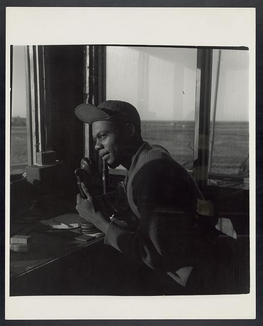 [Sgt. William P. Bostic, 301st F.S. in control tower,...