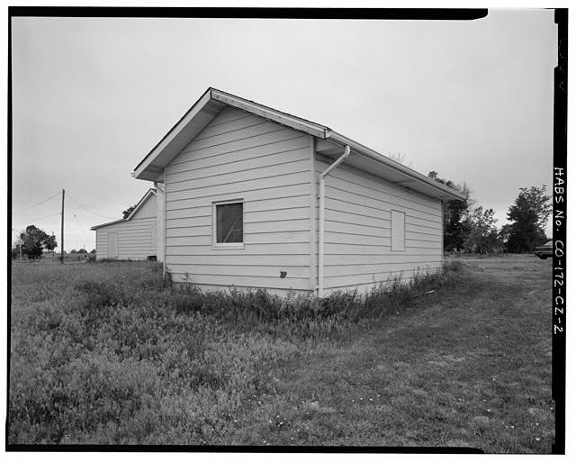 Rear (north side) and west side of building. - Fitzsimons...