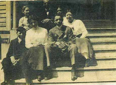 Circa 1915 Rufus Judson Aiken and Nora Hester Aiken and 5 children: Nora and Rufus Aiken on front steps with their 5 children: clockwise Melissa-Leonora-Ernest- Lucile- Otis - Johnson side of my family
