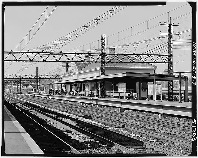 7. 3/4 view of westbound station from trackside showing...