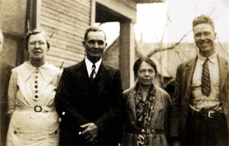 Joel and Myrtle Holcombe with son Chester and his wife Erah