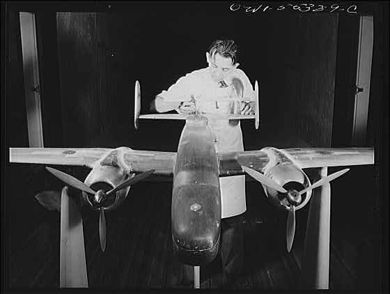 A scale model of North American's B-25 bomber is placed...