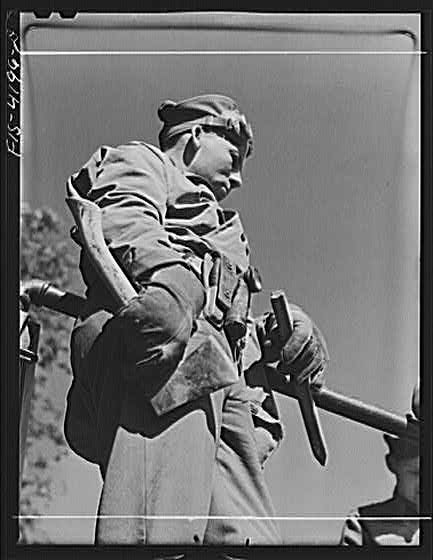 Fort Riley, Kansas. A Signal Corps man attached to a...