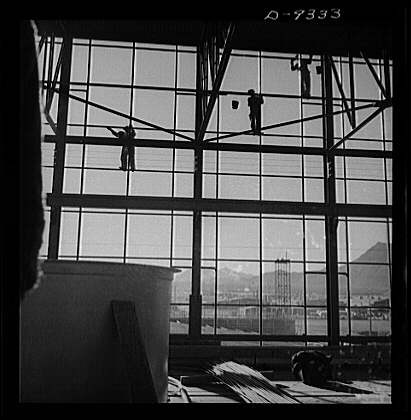 Production. Magnesium. Workmen seventy feet above ground...