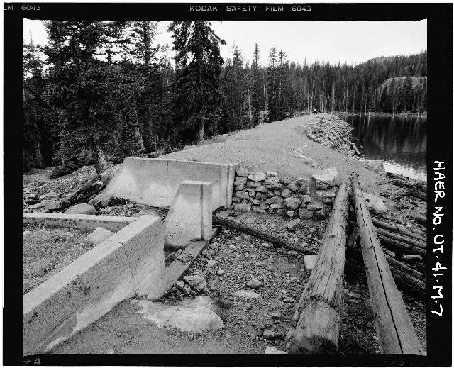 7. VIEW OF CONCRETE SPILLWAY (FREEBOARDS REMOVED) AND...