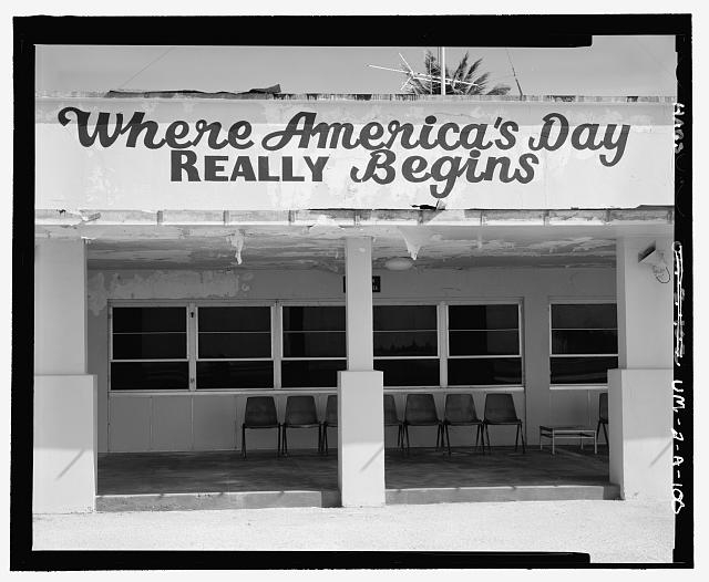 SIGN ON WEST SIDE OF BUILDING ABOVE LANAI ("WHERE...