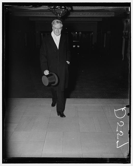 Justice Ben. Cardozo leaving home for White House reception