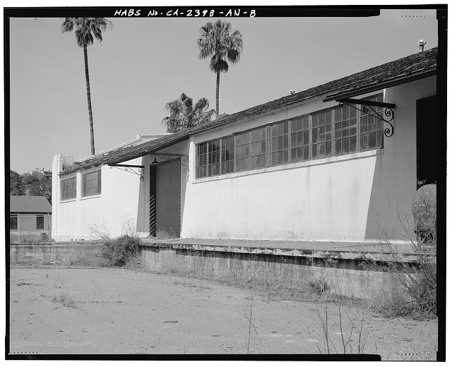 PARTIAL SOUTHEAST ELEVATION, SHOWING IRON ROOF BRACKETS...