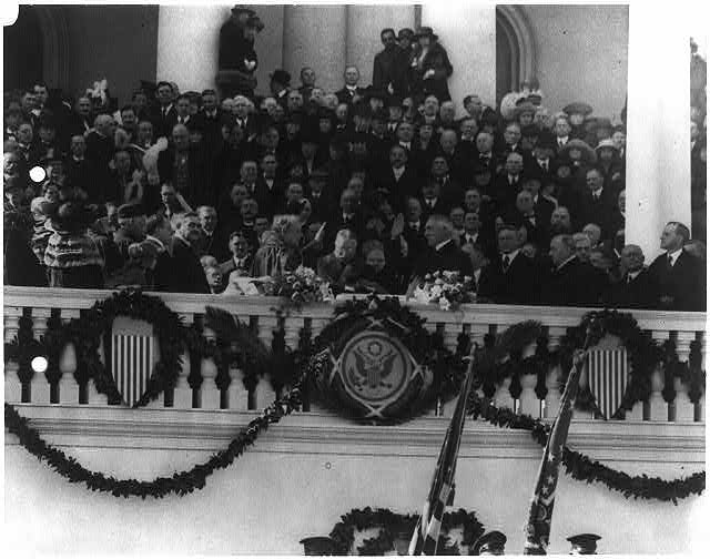 [President Harding taking the oath administered by Chief...