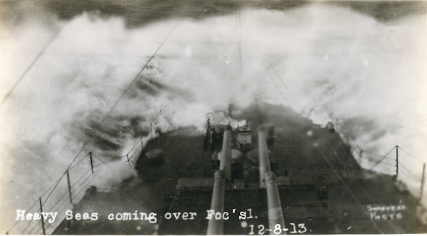 Bow of a warship in rough sea