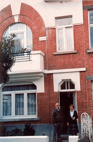 Paul & Christine Heerbrant on front porch of home