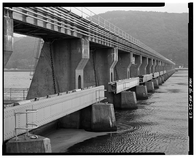23. VIEW OF ROLLER GATE BULKHEADS STORED ON TAINTER GATE...