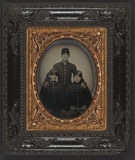 [Three unidentified soldiers in Union uniforms and...