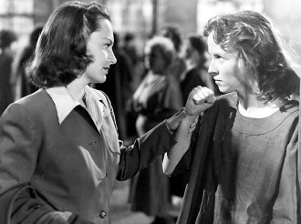 Olivia de Havilland (This is the way Olivia spelled her name) and Betsy Blair