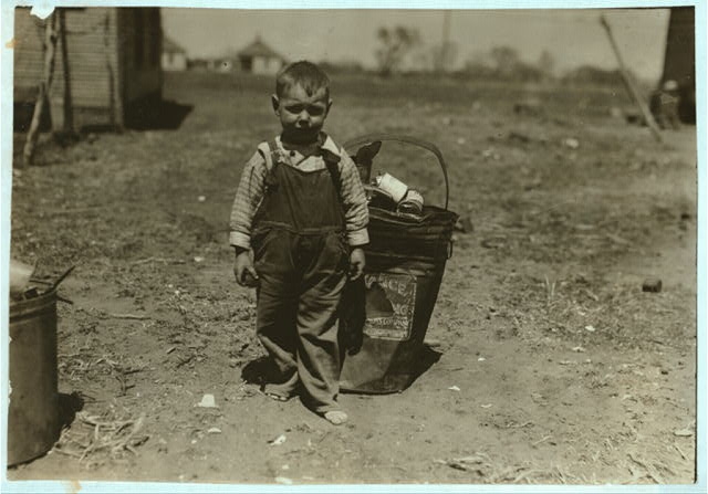 [Small boy standing outdoors]. Location: Oklahoma City,...