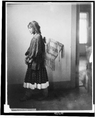 Apache girl with basket
