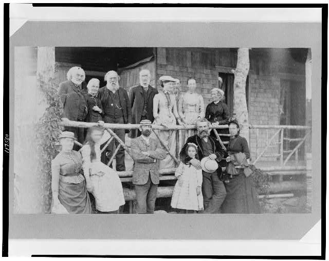 Alexander Graham Bell with his family and friends at the...