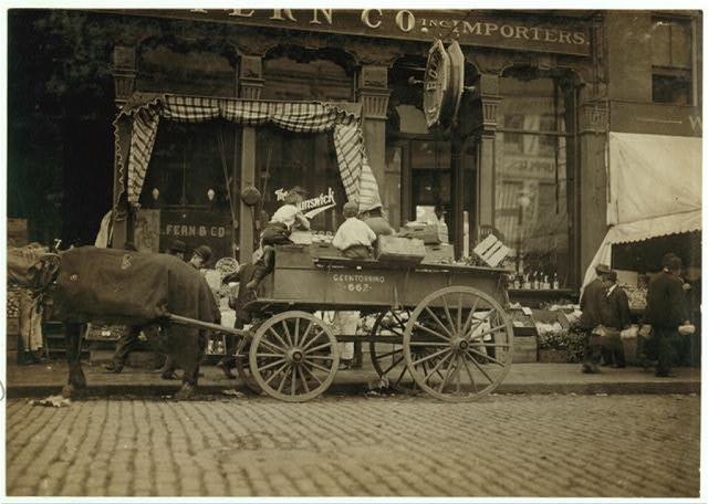 Starting in Business Early. Selling Vegetables in the...