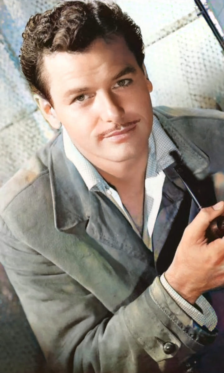 Gig Young in color.