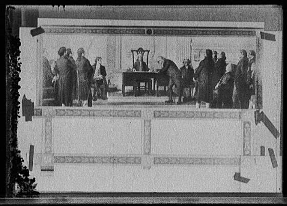 [Franklin signing the Declaration of Independence]