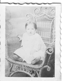 39 DME Baby in Whicker Chair